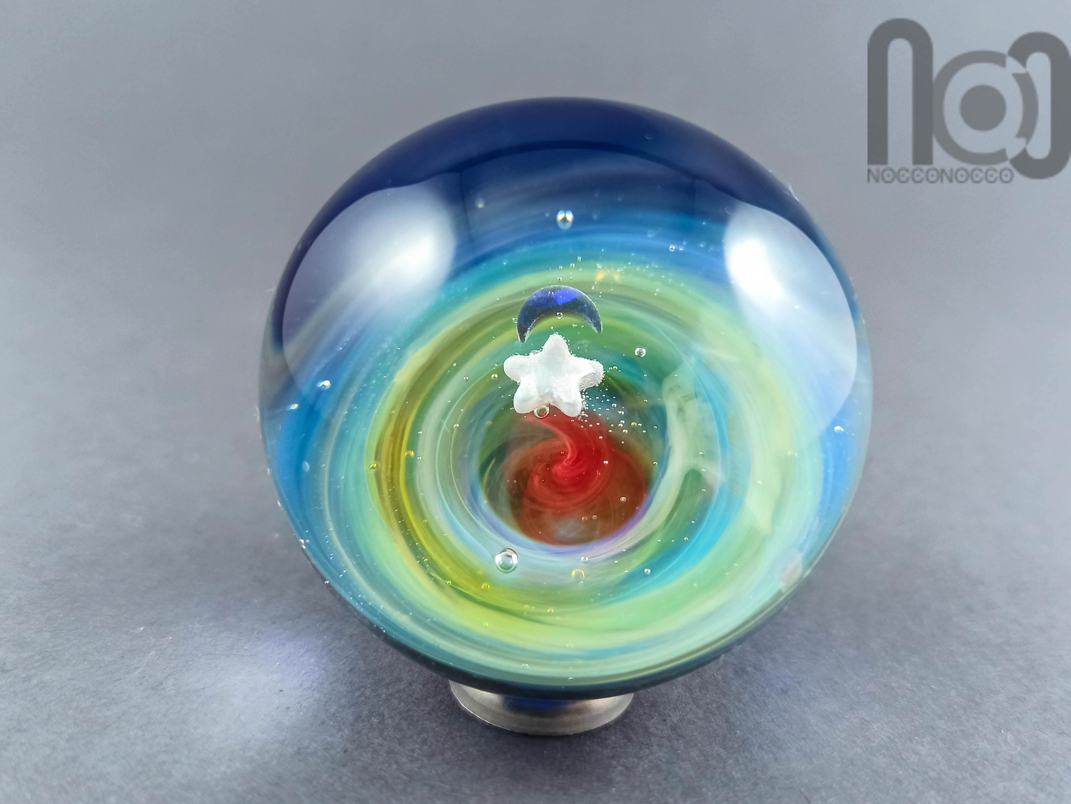Silver Fumed Galaxy Marble With A Floating Opal Crescent Moon and A Star, v53 — handmade borosilicate glass by NoccoNocco, detail view 2 of 3, made in Greece