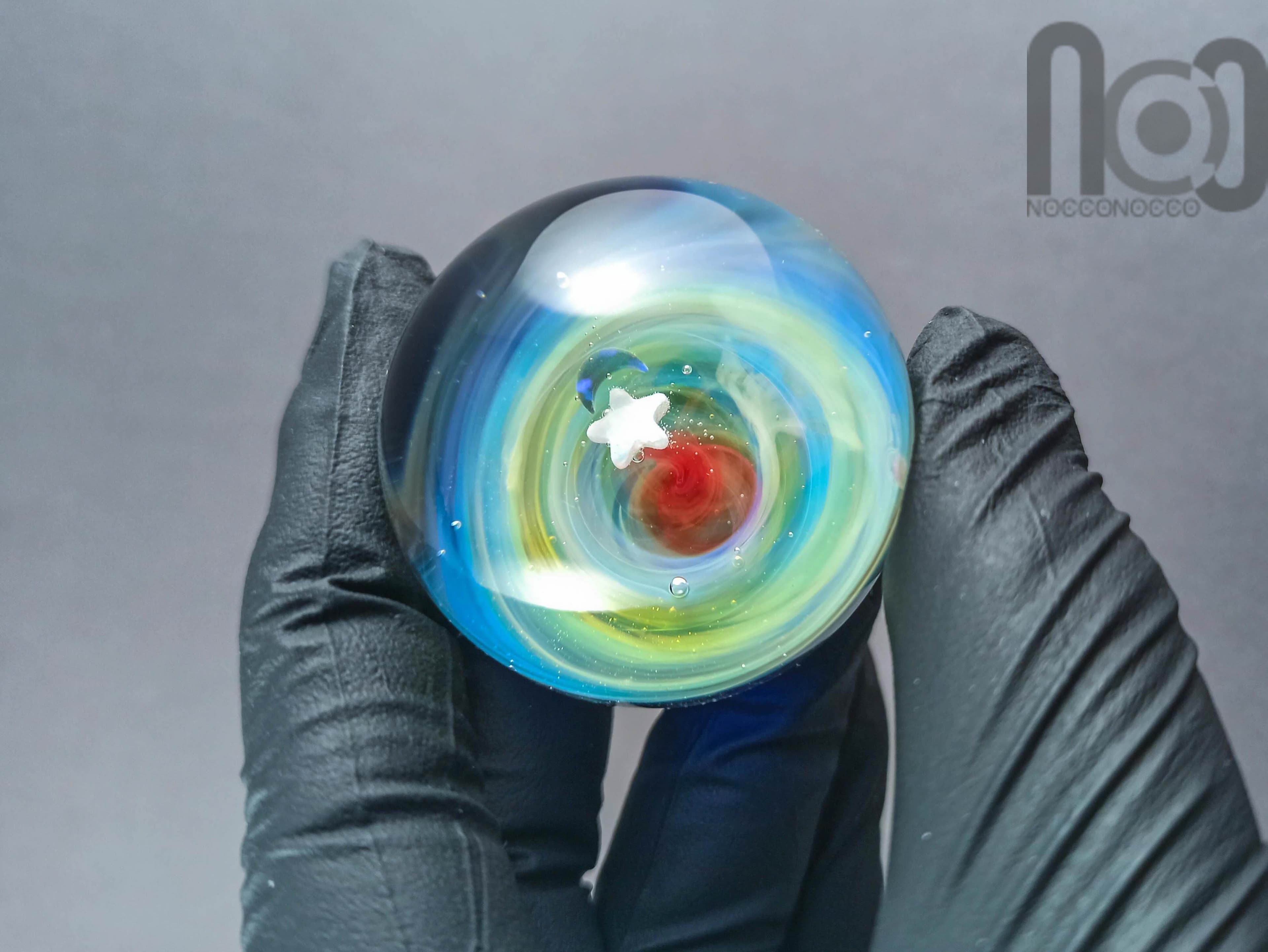 Silver Fumed Galaxy Marble With A Floating Opal Crescent Moon and A Star, v53 — handmade borosilicate glass by NoccoNocco, detail view 3 of 3, made in Greece