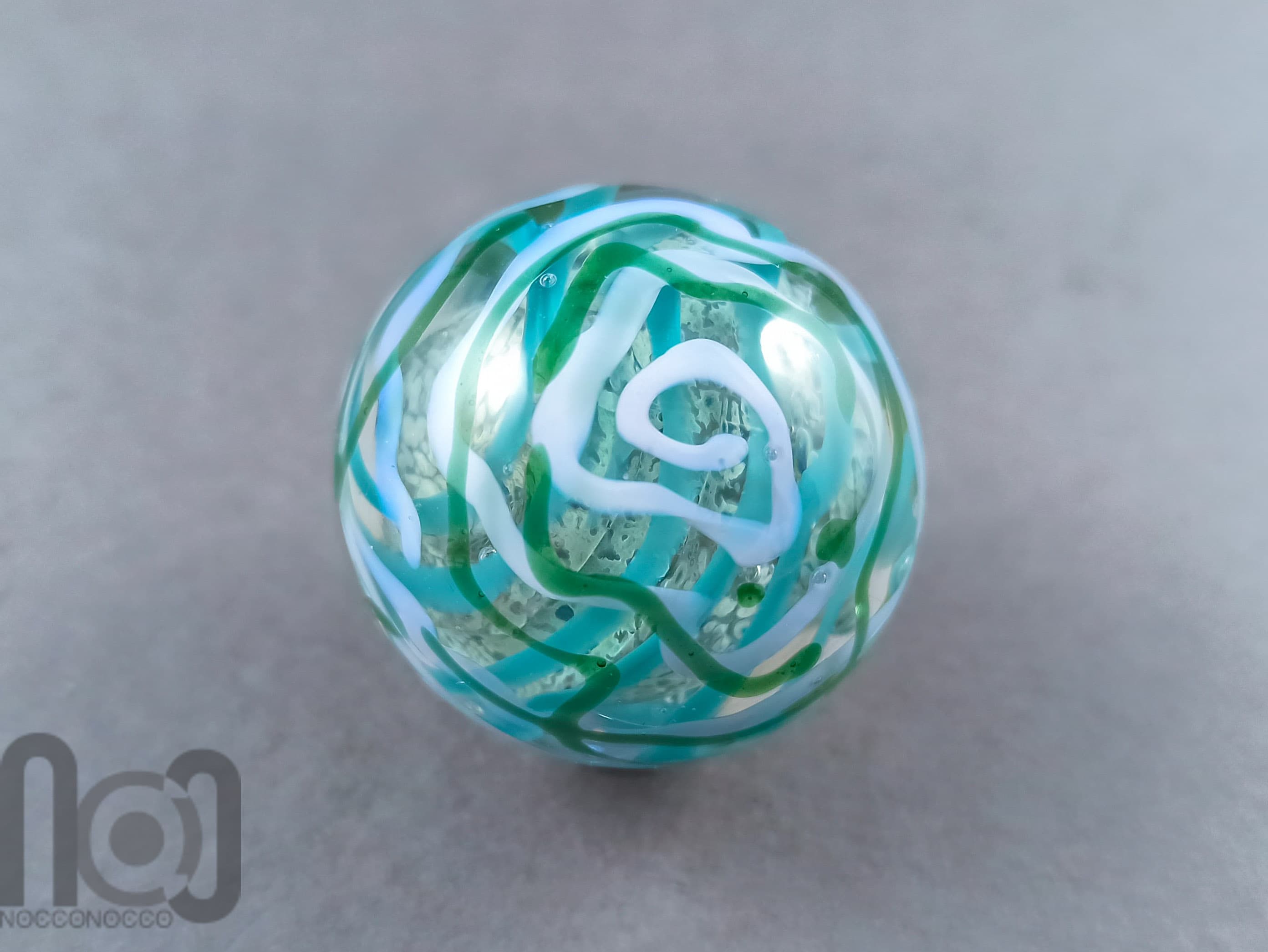 Layered Glass Marble, v145 — handmade borosilicate glass by NoccoNocco, main view, made in Greece