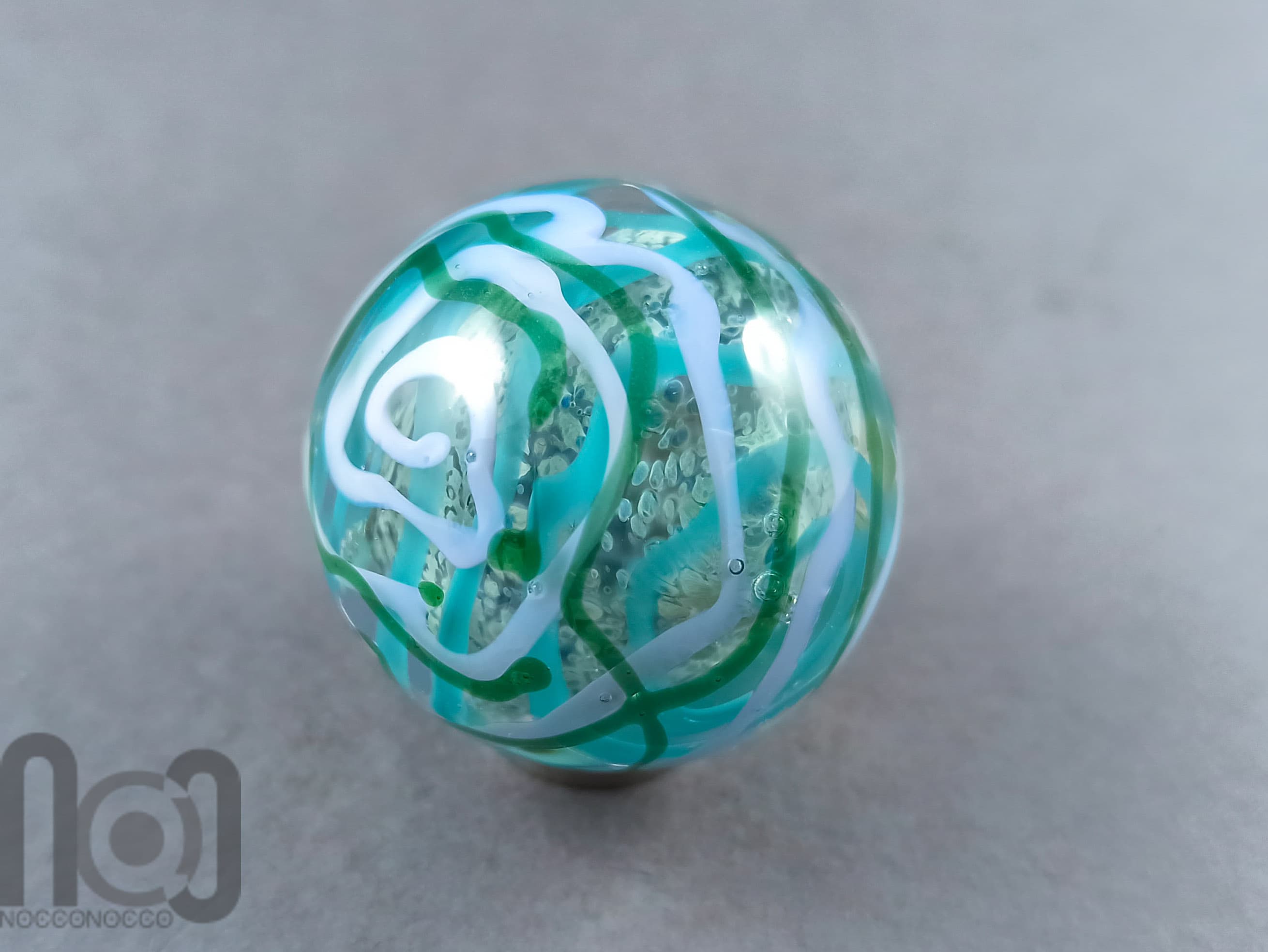 Layered Glass Marble, v145 — handmade borosilicate glass by NoccoNocco, detail view 2 of 4, made in Greece