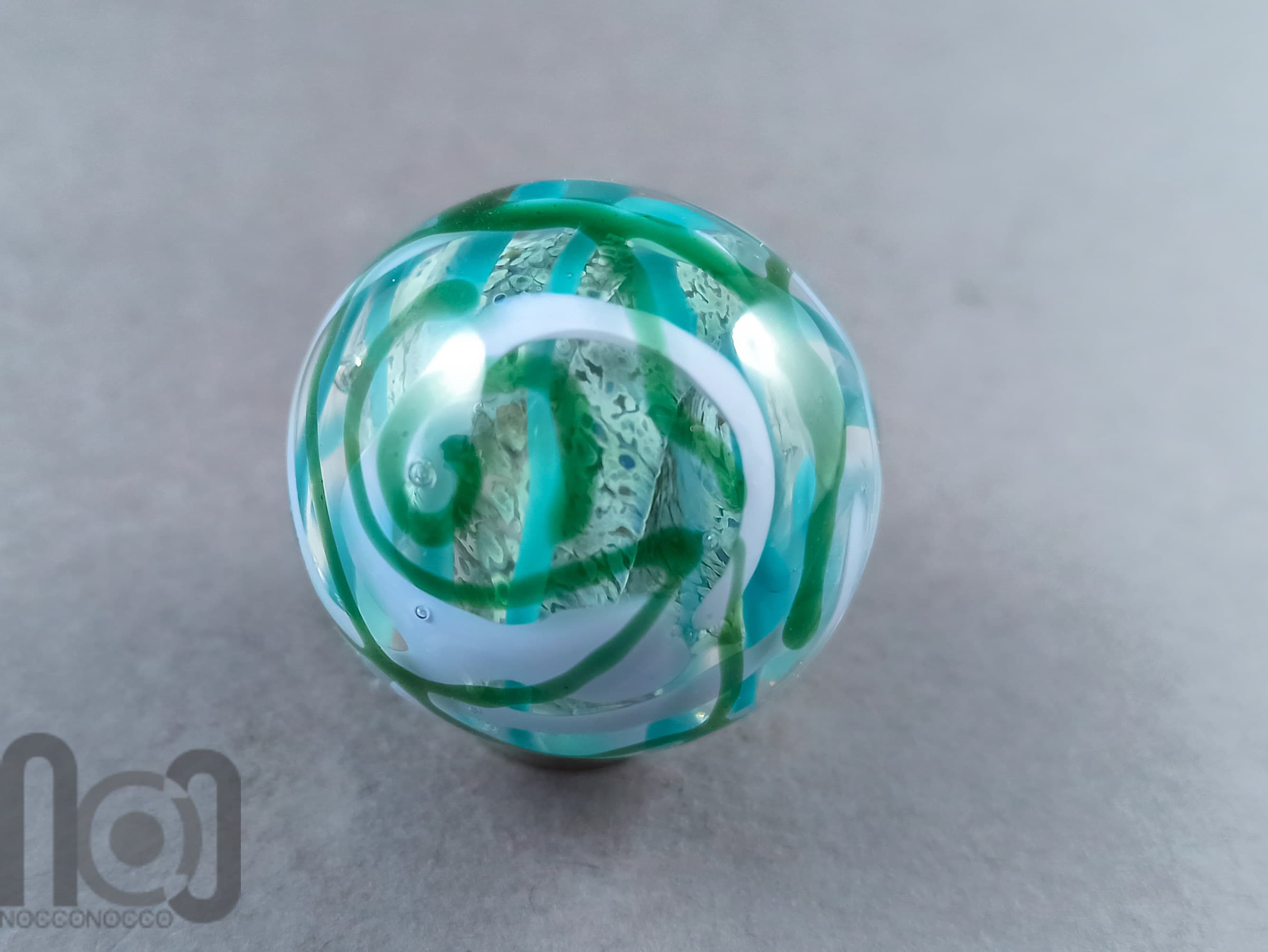 Layered Glass Marble, v145 — handmade borosilicate glass by NoccoNocco, detail view 3 of 4, made in Greece