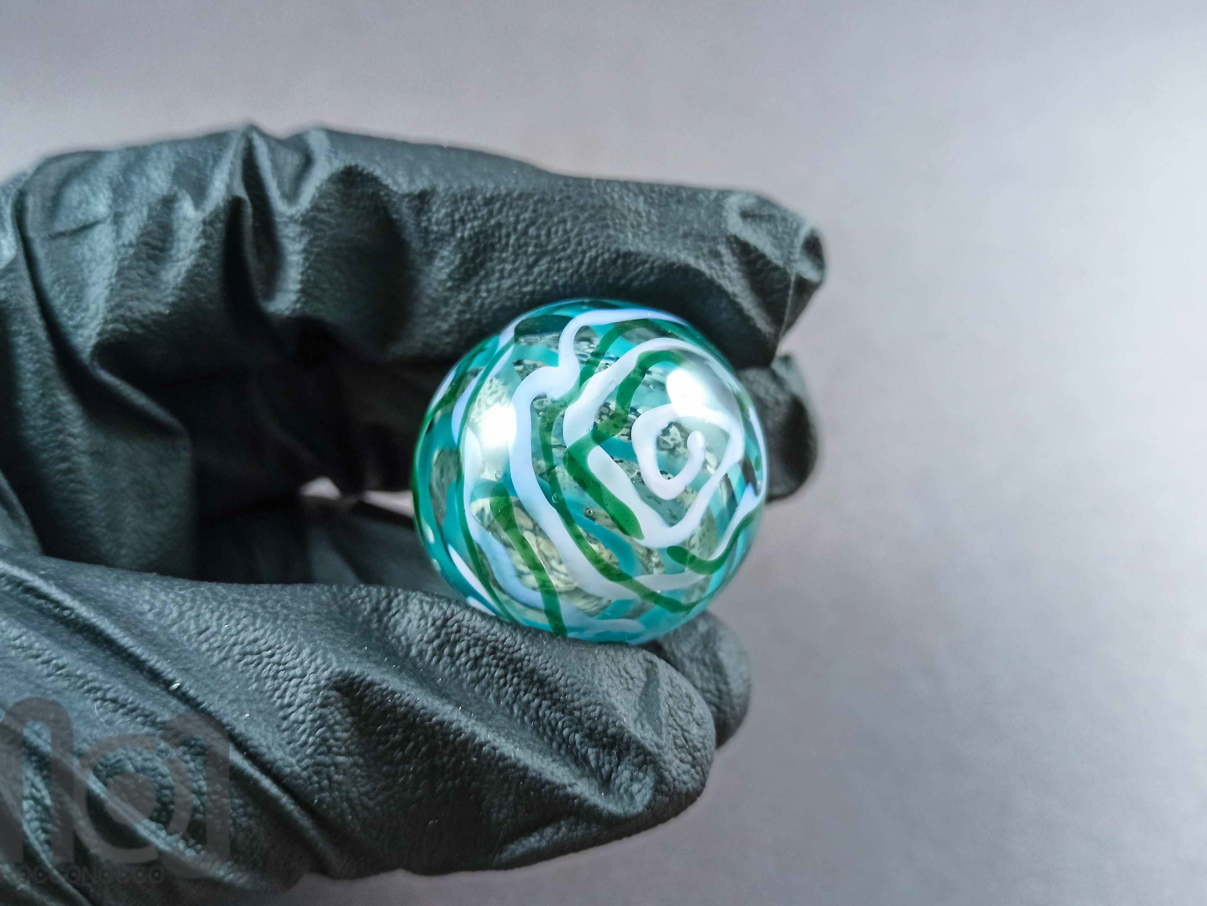 Layered Glass Marble, v145 — handmade borosilicate glass by NoccoNocco, detail view 4 of 4, made in Greece