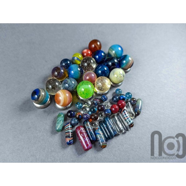 Glass Vial Bottle Filled With Tiny Marbles