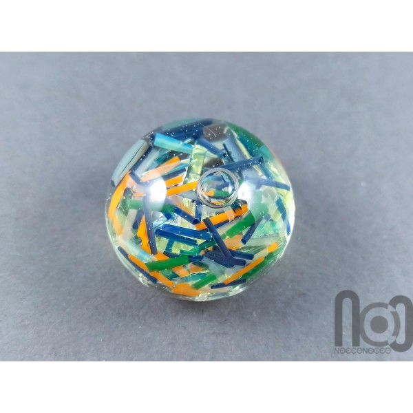 Hollow Glass Marble Filled with Colorful Glass Pieces Floating In Liquid, v292